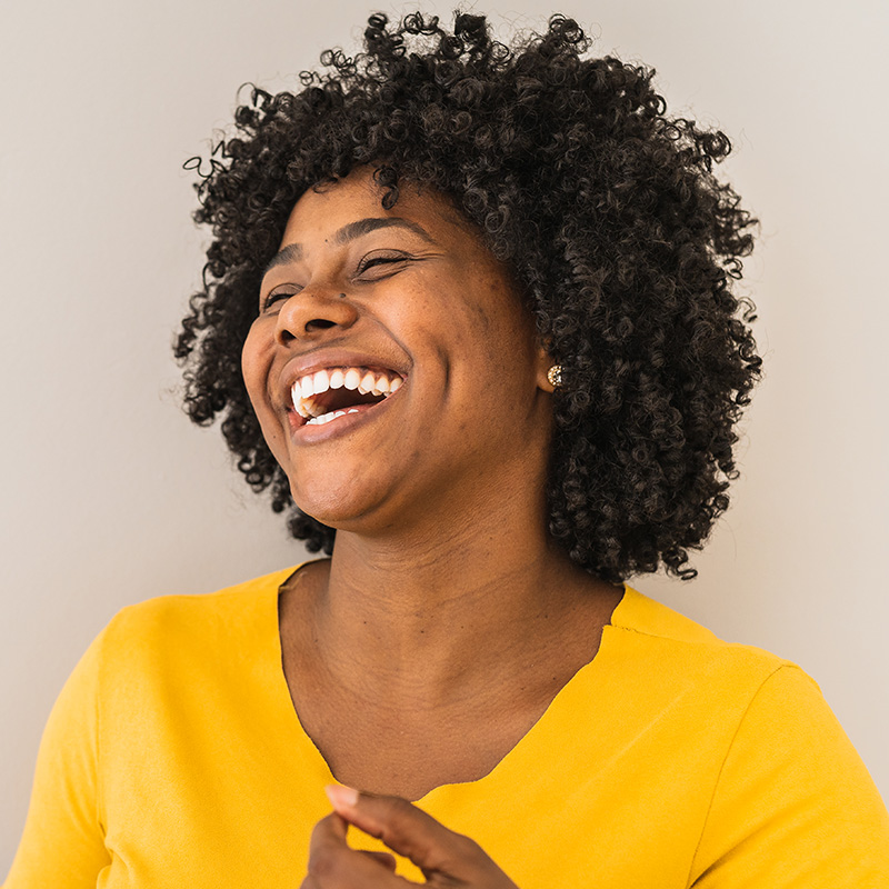 Woman Laughing and Smiling
