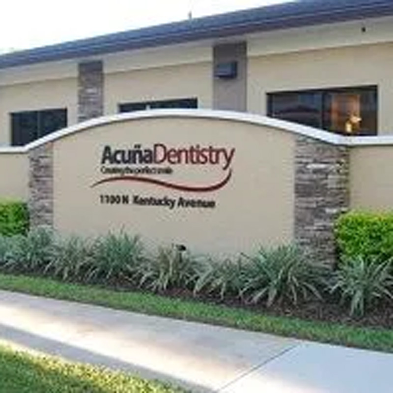 acuna dentistry sign in front of building